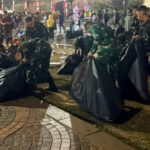 Selesai Amankan HUT ke-81 RI, Prajurit Kodam Jaya Bantu Bersihkan Kawasan Monas